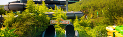 Avontuurlijke zwarte tunnelglijbaan Aqua Fantasy Aquapark Kusadasi