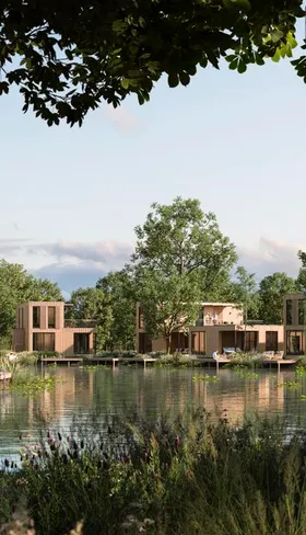 Moderne waterlodges direct aan het water op vakantiepark Landal De Wedderplassen in Groningen.