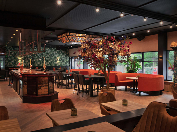 Het sfeervolle en modern ingerichte restaurant van Bospark Ede, perfect voor een familiediner.