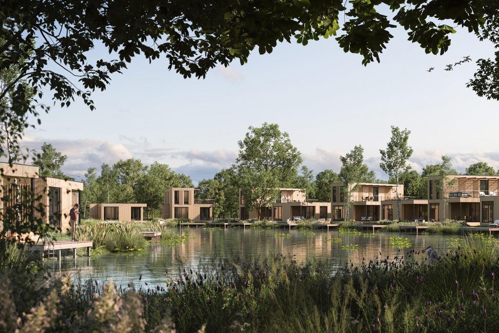 Moderne waterlodges direct aan het water op vakantiepark Landal De Wedderplassen in Groningen.